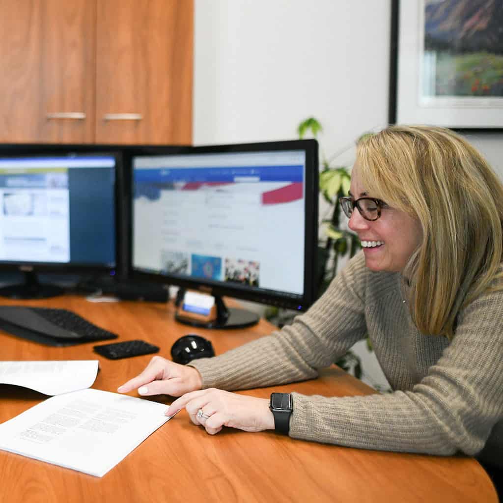 debra grott working with coworker